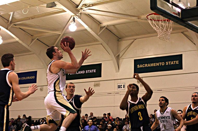 Hornet guard Dylan Garrity pulls up for a jump shot against Northern Arizona on Thursday.