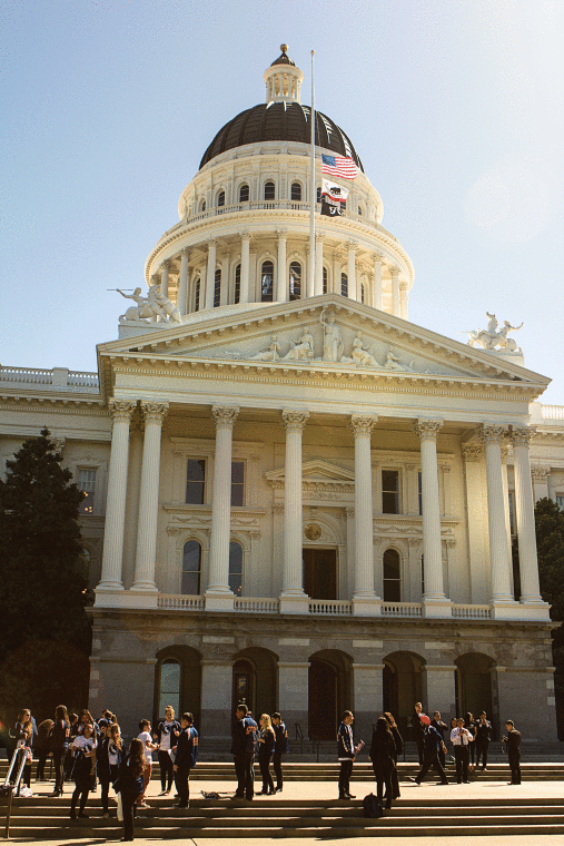 Student representatives from CSU Fullerton meet outside the Capitol during Advocacy Day on Monday.