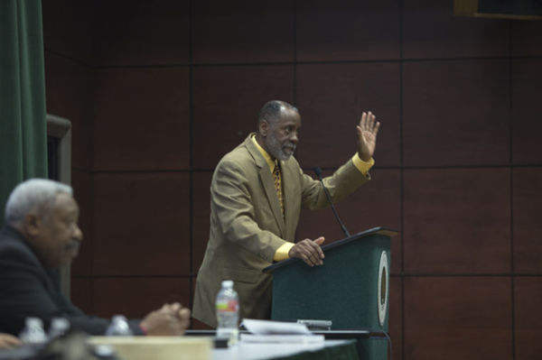 Ethnic studies professor Eric Vega lectures during the forum Thursday morning. 