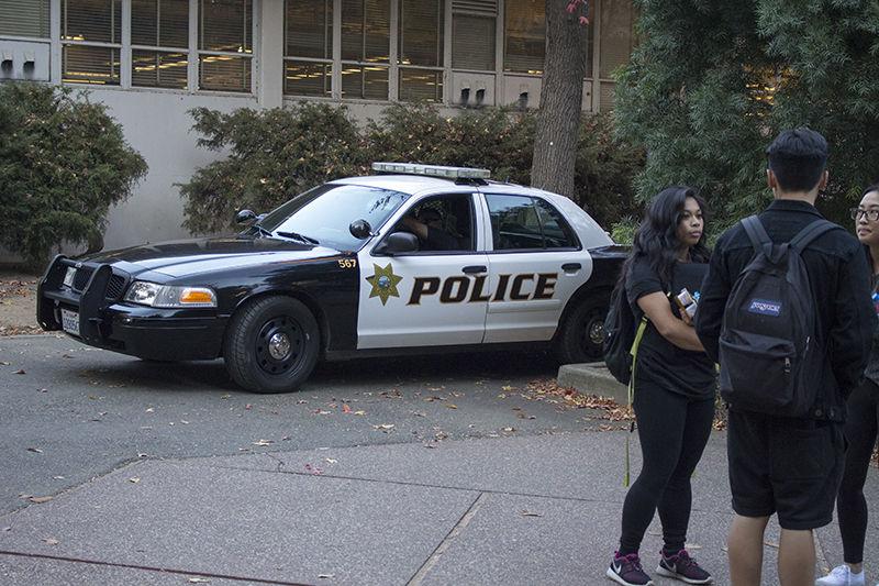 Sacramento State Police placed officers and patrol cars outside of the Union and other buildings following the school shooting threat left in a Union bathroom November 4, 2014. The Sacramento State Police Department will be at a missing persons conference held by the Sacramento Sheriffs Department at Sacramento State Saturday.