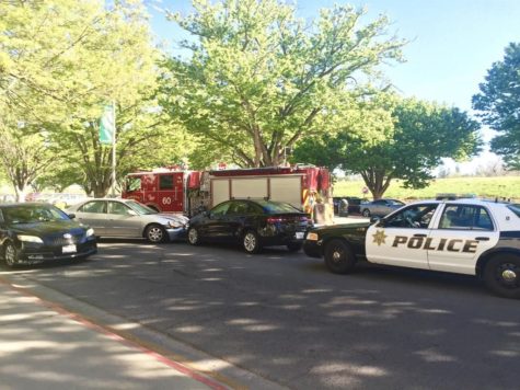 Cars collide head-on by Mendocino Hall