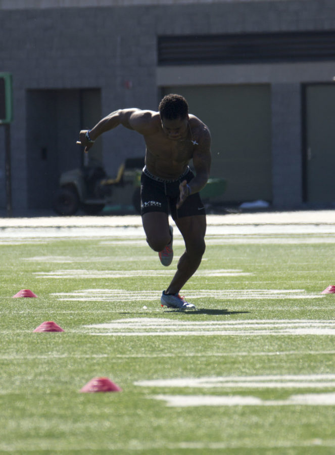 Senior DeAndre Carter sprints down field in a 40-yard dash drill during pro day on Friday, March 6, 2015 at Sacramento State.
