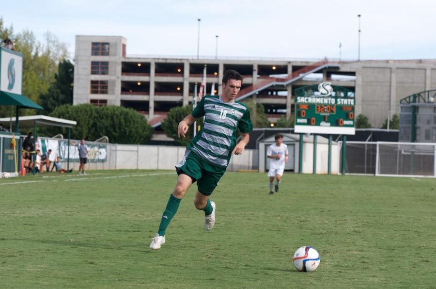 Sacramento State forward Brad Bumgarner runs with the ball during an exhibition match on Sunday, Aug. 23 at Hornet Soccer Field. It was the second of two exhibition matches played at Sac State before the season began.
