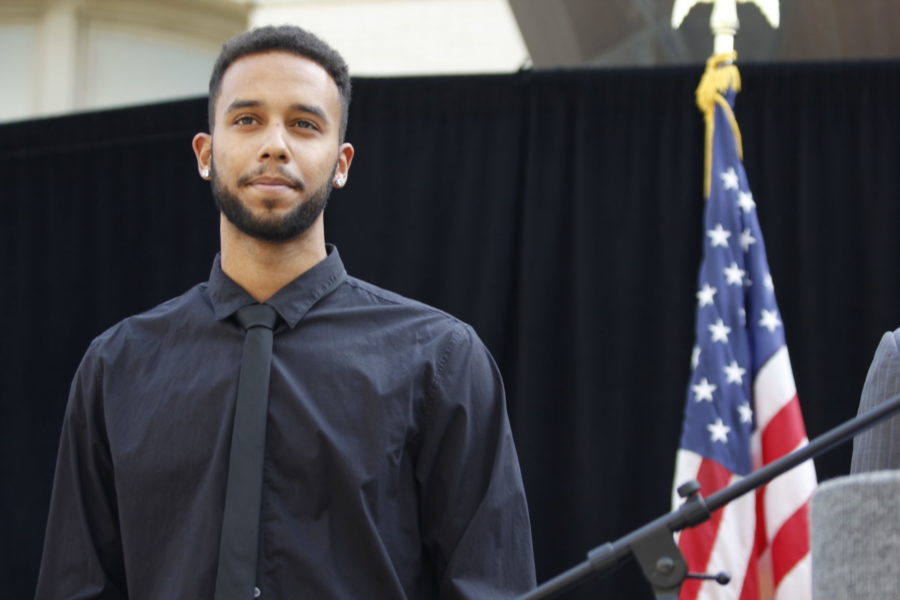 Anthony Sadler, a senior at Sacramento State, listens to Sacramento Mayor Kevin Johnsons speech about the events in France on August 26.