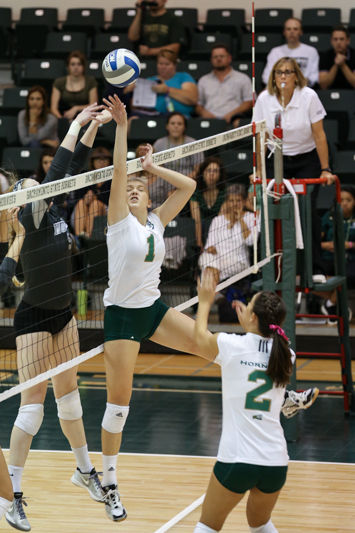 Setter Kennedy Kurtz attempts to tip a pass over the net. Kurtz led the Hornets with 35 assists against Montana on Saturday, Oct. 24, 2015 at the Hornets Nest.