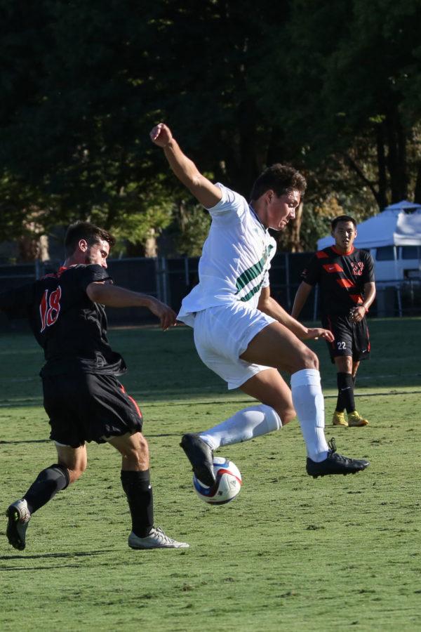 Sacramento State midfielder Elias Rieland leaps up to steal the ball from University of the Pacific forward Tyson Fox on Friday, Sept. 18, 2015 at Hornet Field.