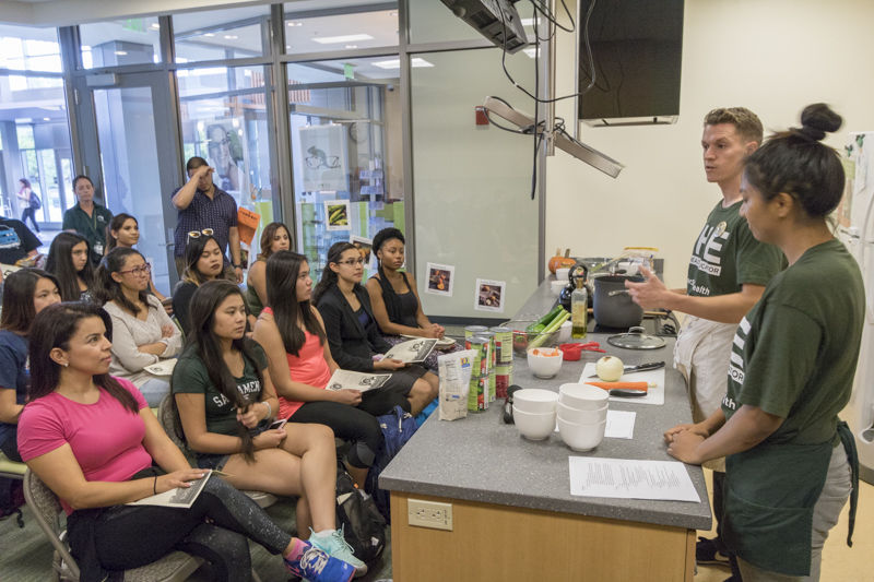 Students listen to Scott Brown and Janice Garcia talk about nutrition, diet and how to cook. The Well, The Cove, Oct. 15, 2015