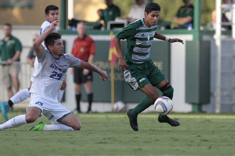 Isaac Flores takes the ball from a UC Santa Barbara player during Sacramento States mens soccer game on Wedenesday, Oct. 14, 2015. The Hornets upset the Gauchos 5-2.