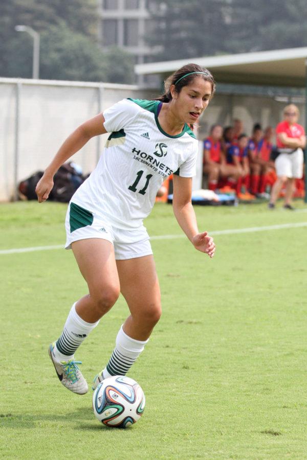 Midfielder Jennifer Lum dribbles the ball towards the goal against Fresno State. Lum had two shots on Sunday, Sept. 13, 2015 at Hornet Field.