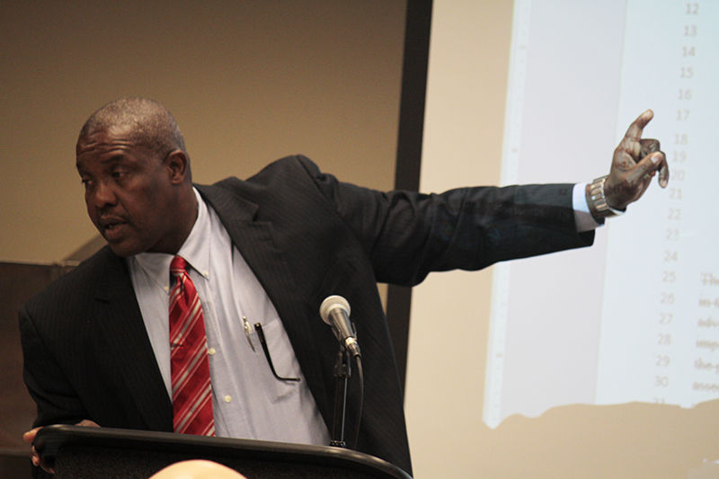 Jim Bowie pointing to measure being addressed at the Faculty Senate meeting Thursday, December 3, 2015 in the University Union.