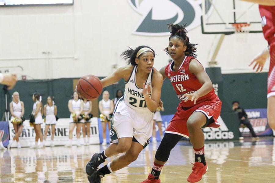 Adella Randle-El drives the lane against Violet Kapri Morrow of Eastern Washington on Saturday, Jan. 30 in the Hornets Nest. The Hornets went on to lose the game 100-83.