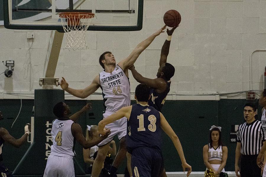 Sacramento State center Eric Stuteville blocks a shot against Montana State on Saturday, Feb. 6, 2016. Stuteville finished the game with 5 points and one block in a 79-76 loss. 