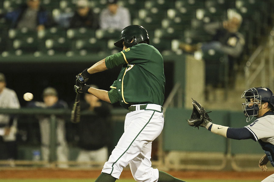 Trent Goodrich swings and makes contact with the ball against Nevada at Raley Field, Wednesday, March 9. The Hornets beat the Wolfpack 5-2.