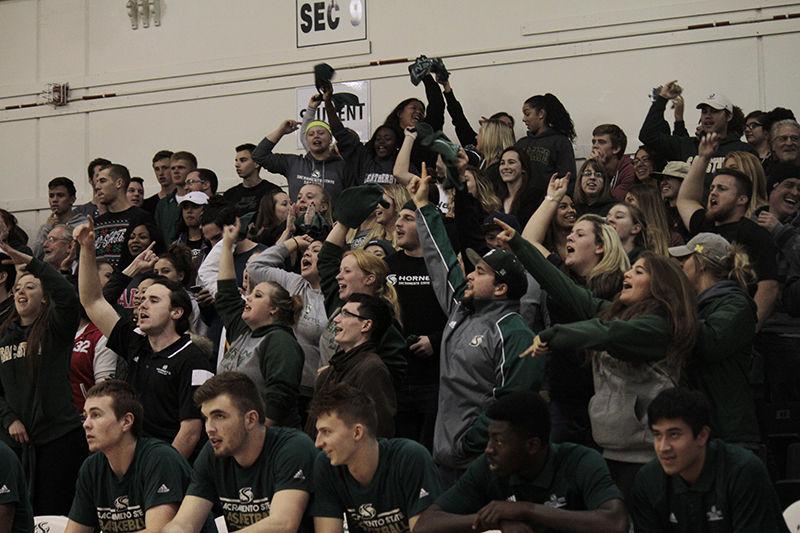 The Green Army cheering and showing school spirit during Sacramento States mens basketball game against UC Davis on Tuesday, Nov. 24, 2015 in the Hornets Nest