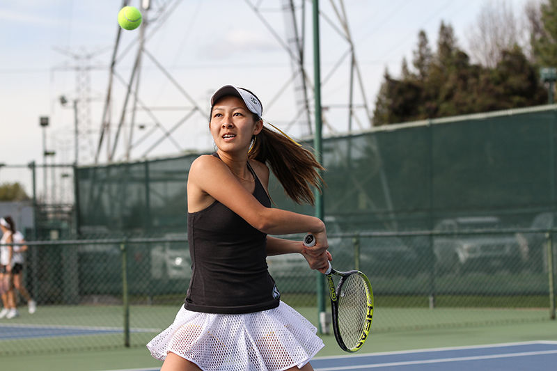 Senior Jennifer Ong backhands a ball against Portland State at the Rio Del Oro Racquet Club Saturday, Jan. 30, 2015. The Hornets went on to defeat the Vikings 6-1.