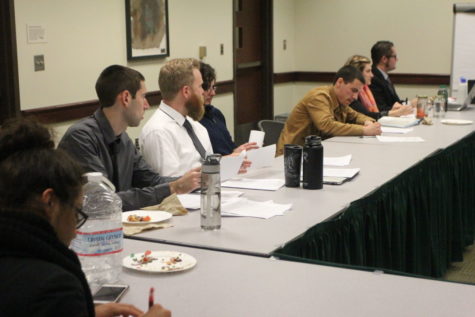 Environmental studies and biological science majors practice for a climate change conference in the Forest Suite of the University Union, Wednesday, March 9.
