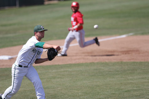 Austin Root makes a play on the ball and throws to first base for the out against New Mexico at John Smith Field, Tuesday, Mar. 29. Root was gave up four hits and two earned runs in a 12-3 loss