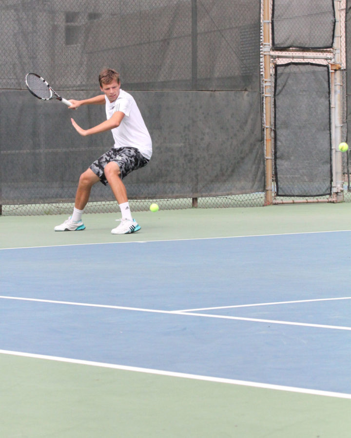 Freshman Mikus Losbergs hits a forehand to a Montana State player. The Hornets won 6-1 on Feb. 27 at the Sacramento State Tennis Courts.