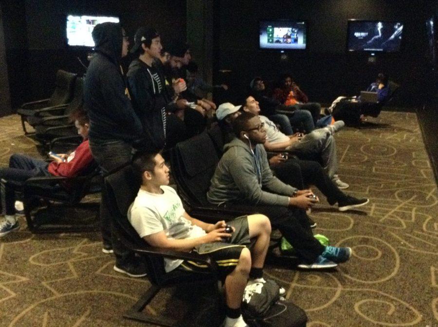 Students participate in the NBA 2k16 tournament in the University Union Games Room, Friday, April 22