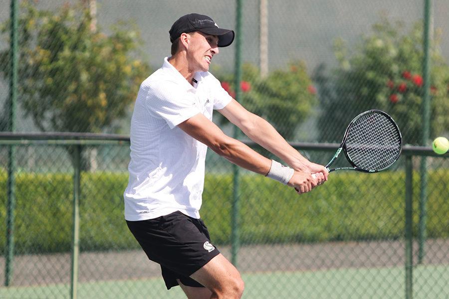 Kasparas Zemaitelis strikes the ball against Wacil Bendjelti of Eastern Washington at Rio Del Oro Racquet Club, Wednesday, March 23. Sacramento State defeated Eastern Washington, 7-0.