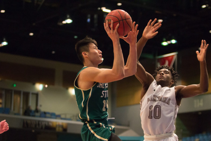 Freshman Jeff Wu takes a shot in the paint against Montana in the Reno Events Center Thursday, March 10. Wu had 11 points, two rebounds and one steal in a Hornets 70-53 loss.