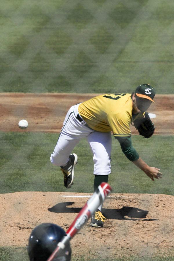 Junior Max Karnos pitches a fast ball at John Smith Field, Saturday, April 2. The Hornets played the Northern Colorado Bears, winning 5-1.