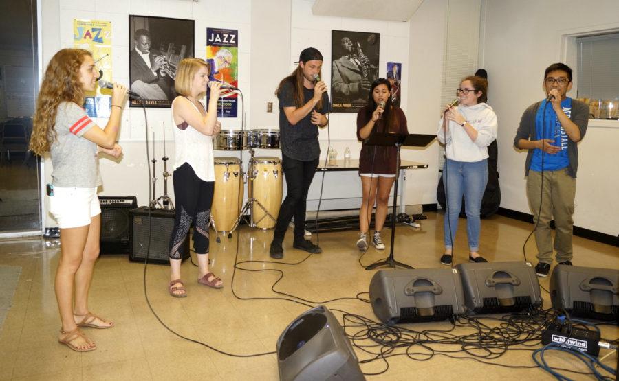 Members of jazz vocal group C-Sus Voices rehearse together to prepare for their performance at the Monterey Jazz Festival on Sunday, Sept. 18.
(Photo by Marivel Guzman)