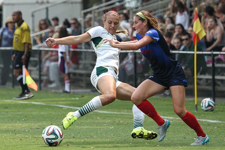 Forward Adaurie Dayak steals the ball from a Fresno State defender on Sunday, Sept. 13, 2015 at Hornet Field. The Hornets fell to the Bulldogs, 1-0. (Photo by Francisco Medina)