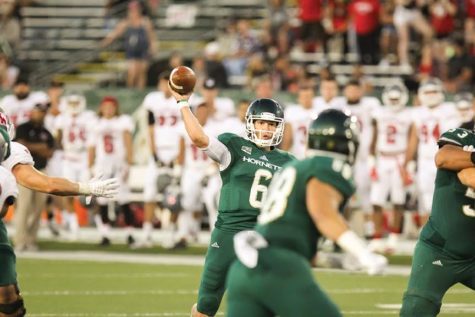 Sophomore Nate Ketteringham throws the ball against Western Oregon, Sep. 3, 2016. Ketteringham had two passing touchdowns and one rushing touchdown in a Hornets 38-30 loss. (Photo by Matthew Dyer)