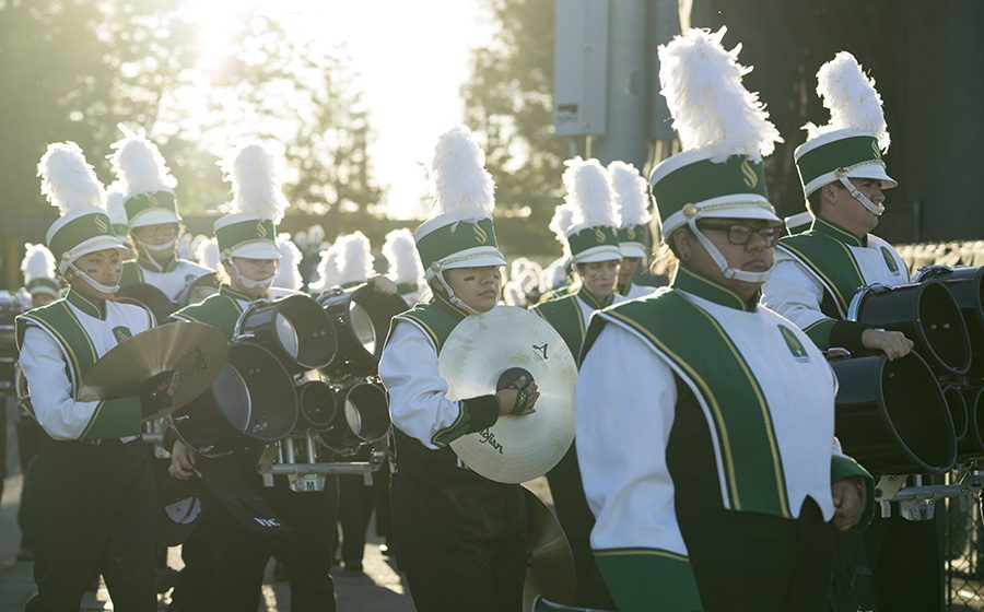 Members+of+the+Sacramento+State+marching+band+make+their+way+into+Hornet+Stadium+for+the+homecoming+football+game+on+Saturday%2C+Oct.+8.++Senior+clarinet+member+Ydalia+Hernandez+leads+the+way.+%28Photo+by+Michael+Zhang%29