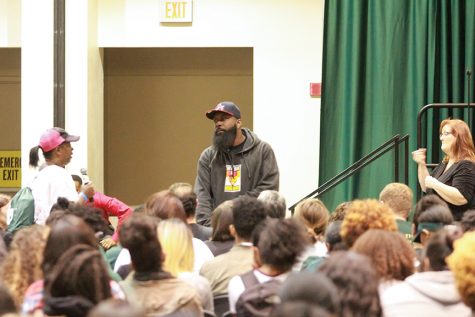 Michael Brown Sr. speaks to Arcellia Huggins, left, during a question and answer session at Brown's lecture in the University Union on Thursday. Huggins said that her husband was killed by Oakland police in 2013. (Photo by Matthew Dyer)