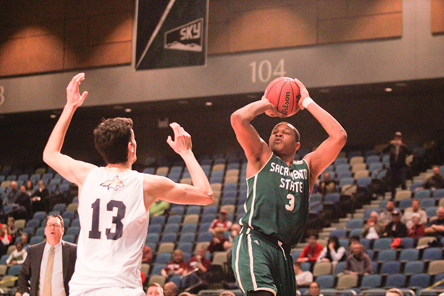 Sacramento State junior forward Justin Strings attempts a shot against Montana State in the Big Sky Tournament on March 8, 2016 in the Reno Events Center. (Photo by Matthew Dyer)