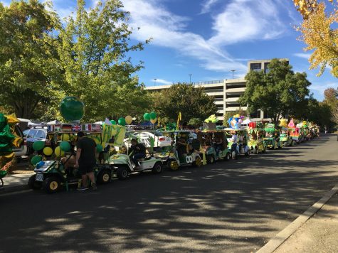 Eighteen golf carts line up before the parade during the homecoming game at Hornet Stadium, Saturday, Oct. 8. (Photo by Will Moon)