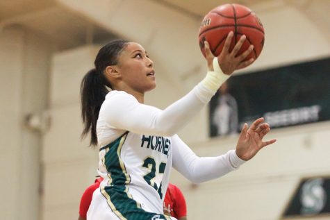 Sacramento State junior guard Maranne Johnson attempts a layup in the paint against Holy Names at the Hornets Nest on Sunday, Oct. 30. (Photo by Matthew Dyer)