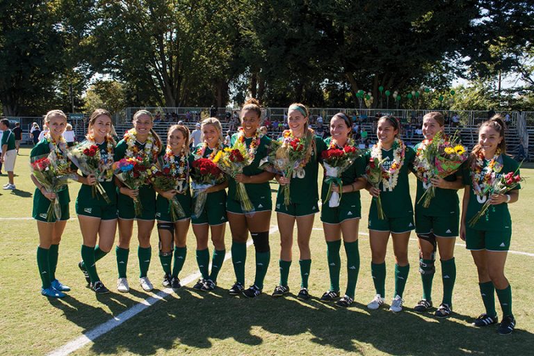 Sacramento State seniors pose for a picture on senior day before defeating Idaho State 2-1 at Hornet Field on Sunday, Oct. 9. (Photo by Matthew Dyer)