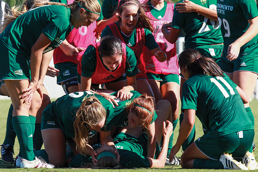 Sacramento State senior Kassidy Kellogg celebrates with her teammates after scoring the game-winning goal against Idaho State at Hornet Field on Sunday, Oct. 9. (Photo by Matthew Dyer)