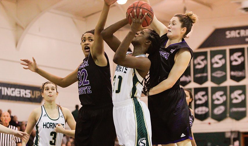 Sacramento State senior forward Kyhonta Doughty attempts a shot in the paint against Weber State at the Hornets Nest on Feb. 11, 2016. (Photo by Matthew Dyer)