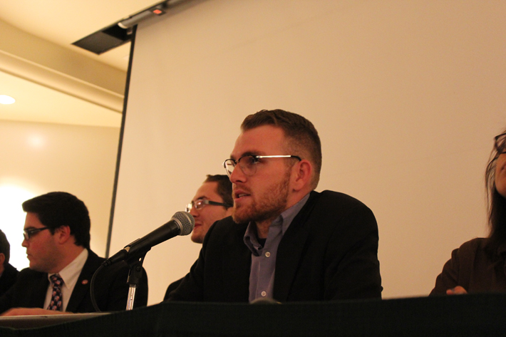 Sacramento State graduate Ryan Allain moderates a debate between the College Republicans and the College Democrats in the Hinde Auditorium on Oct. 26, 2016. (Photo by Rin Carbin)