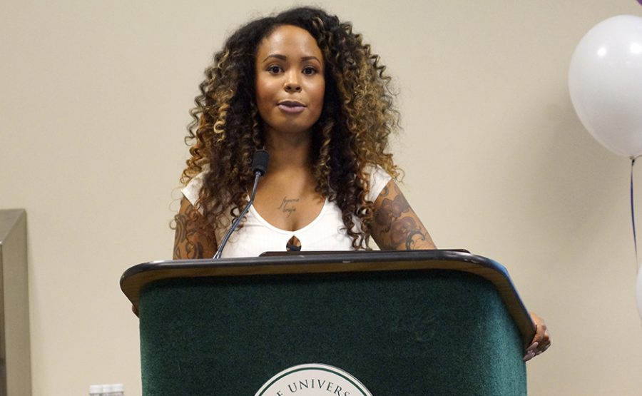 Motivational speaker Kim Katrin Milan, founder of The People Project, speaks at the Third Annual Empowering Women of Color Conference in the Orchard Suite at Sacramento States Univesity Union on Friday, Oct. 21, 2016. (Photo by Marivel Guzman)