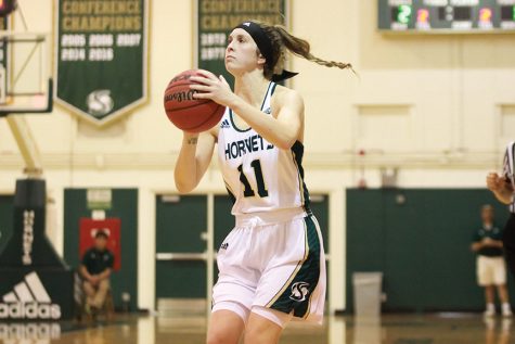 Sacramento State senior guard Emily Easom shoots a three pointer against Cal Poly at the Hornets Nest on Sunday, Nov. 13. (Photo by Matthew Dyer)