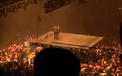 Kanye West hugs Kid Cudi on the hovering platform during his concert at the Golden 1 Center, Saturday, Nov. 19. (Photo courtesy of Jasmine Singh)