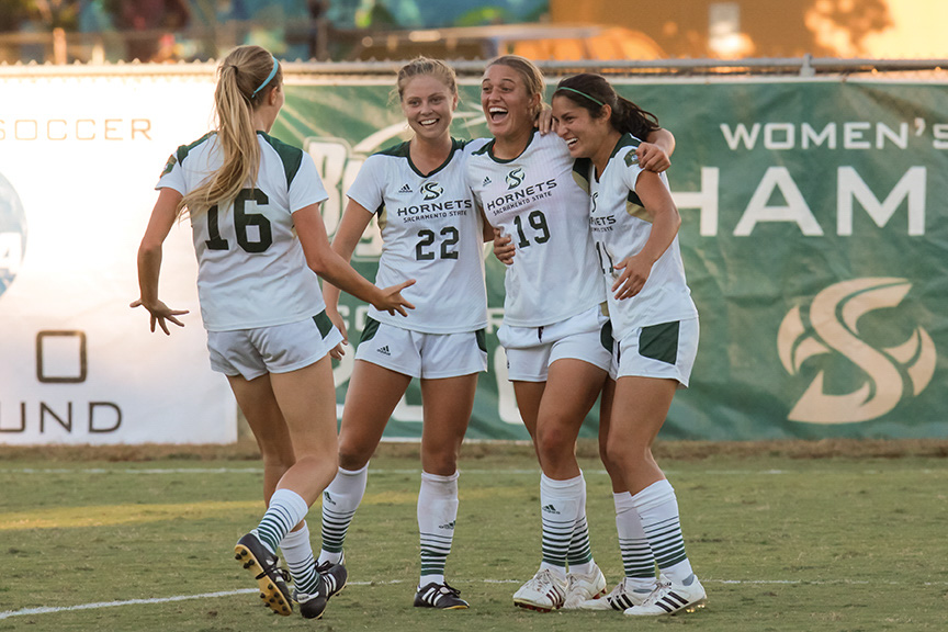 Sacramento State senior forward  Adaurie Dayak celebrates with her teammates after scoring the game winning goal against Weber State at Hornet Field on Oct. 21. Dayak was named all-Big Sky honorable mention for the second time in her career. (Photo by Matthew Dyer)