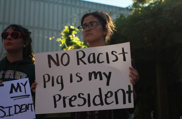 Students protest in the Library Quad following the election of Donald J. Trump as president of the United States on Nov. 9, 2016.