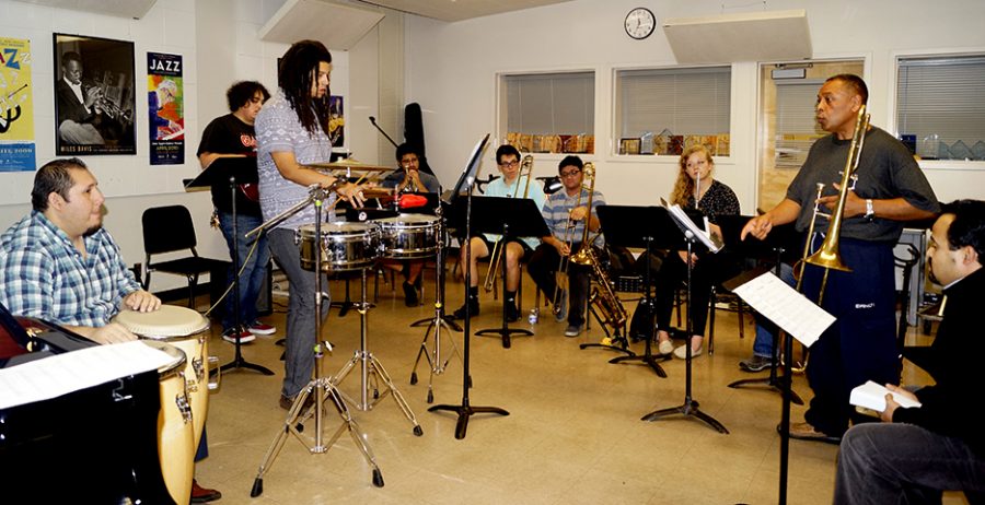 Members of the Latin Jazz Ensemble rehearsal for their Nov. 29 concert inside Capistrano Hall.
(Photo by Marivel Guzman)