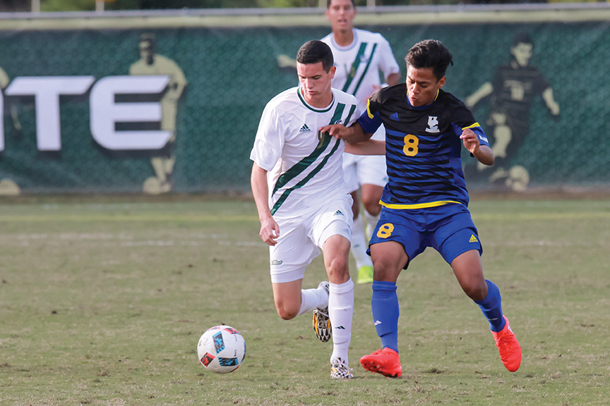 Sacramento State freshman midfielder Christian Webb battles Ricardo Ruiz of UC Riverside for the ball at Hornet Field on Saturday, Nov. 5. (Photo by Matthew Dyer)