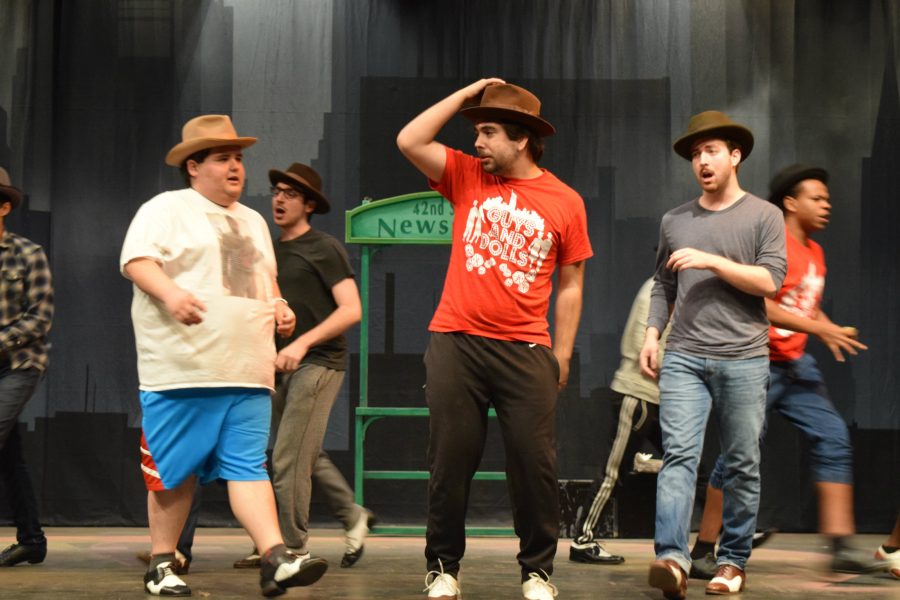 Senior theater major Panagiotis Roditis (center) leads the ensemble during rehearsal in the new production of Guys and Dolls in Shasta Hall. The musical will run from Nov. 9 to 20.
(Photo by Edrian Pamintuan)