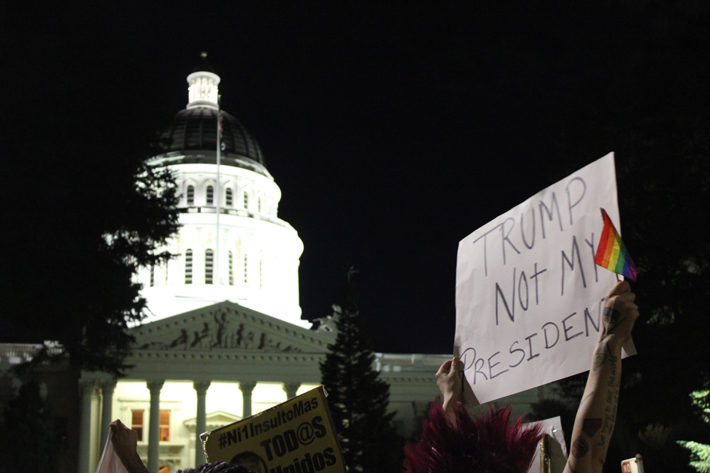 Hundreds of people protest the election of Donald Trump to the presidency of the United States in front of the California State Capitol in Sacramento on Wednesday, Nov. 9. (Photo by Rin Carbin)