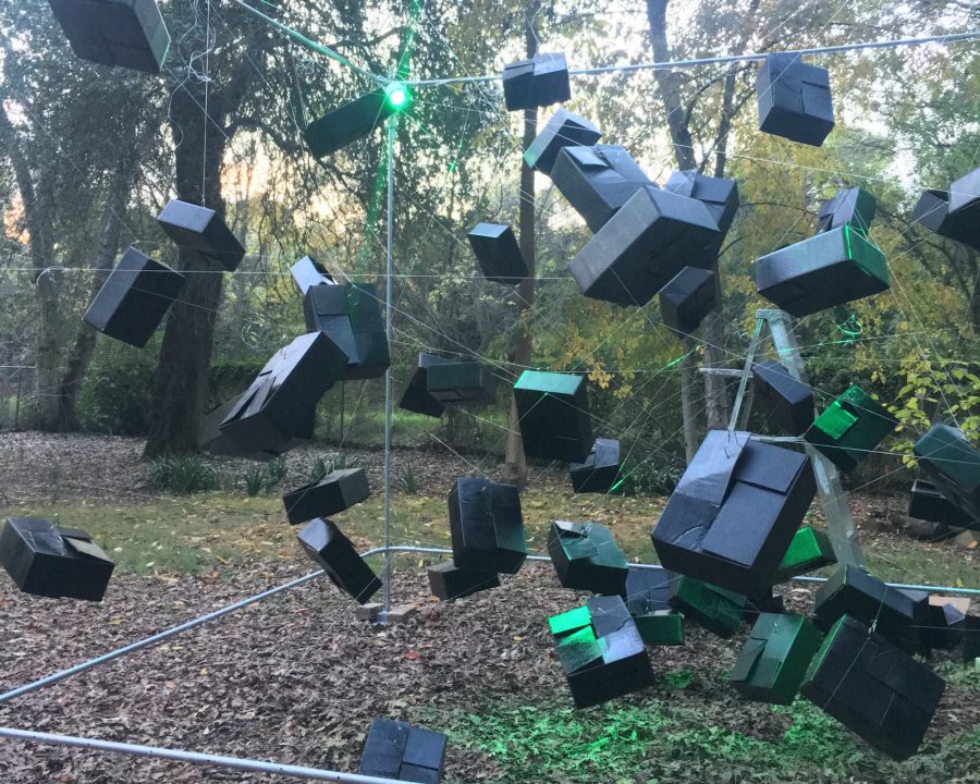 Senior art major Tammy Helenskes elaborate set for her performance at show entitled Barmecidal Banquet: An Illusionary Feast of Dreams at the Sacramento State University Arboretum on Wednesday night.
(Photo by Edrian Pamintuan)