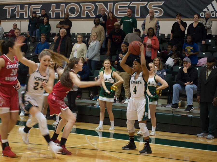 Sacramento State junior guard Justyce Dawson looks for teammate to pass the ball to against Eastern Washington at the Nest on Feb. 2. (Photo by Andro Palting)