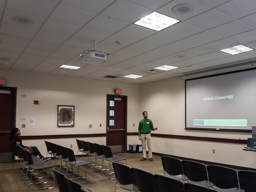 Sacramento State Associated Students, Inc.'s Election Officer Isaac Curtis talks during a presentation at the Walnut Room in the second floor of the University Union on Feb. 23. (Photo by Andro Palting)